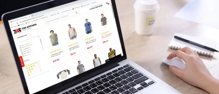 shopping for wholesale clothing online with a laptop