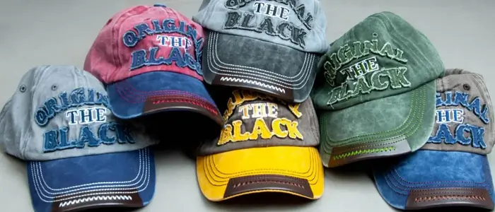 collection of custom embroidered hats in different colours