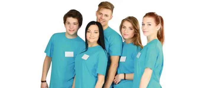 group of young people wearing blue wonderwink scrubs