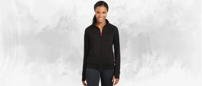  a woman wearing a black sport-tek ladies nrg fitness jacket