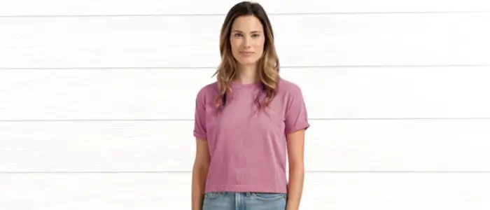 woman wearing a trendy crop top, showcasing stylish women's summer fashion