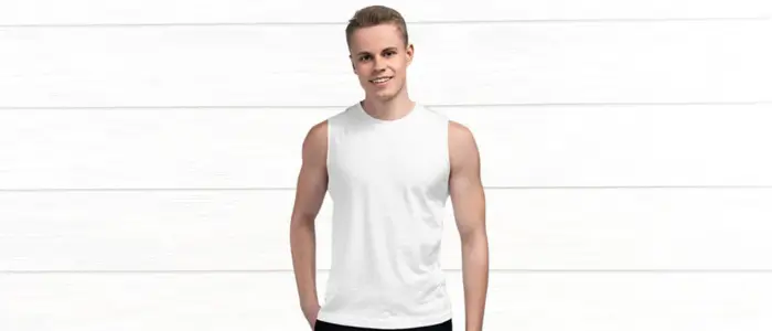 guy in a white muscle tank top, showing off his physique