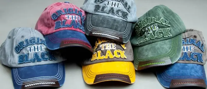 wholesale headwear featuring an assortment of baseball caps in different colors