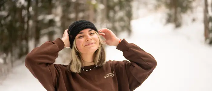 women wearing brown crew neck sweatshirt