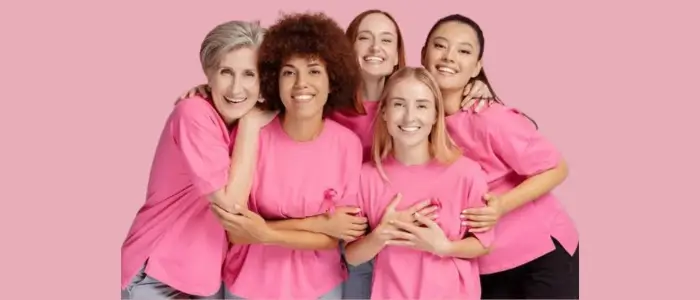 women's wearing pink shirt for breast cancer awareness 